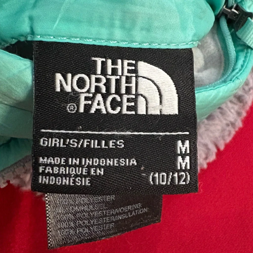 Girls’ North Face  Reversible Jacket in Teal and Gray. Size 10-12.